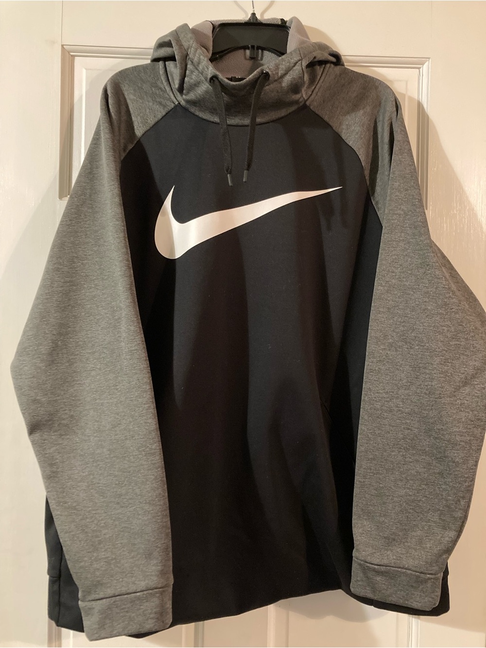 Nike Black Hoodie with Gray Sleeves and White Swoosh